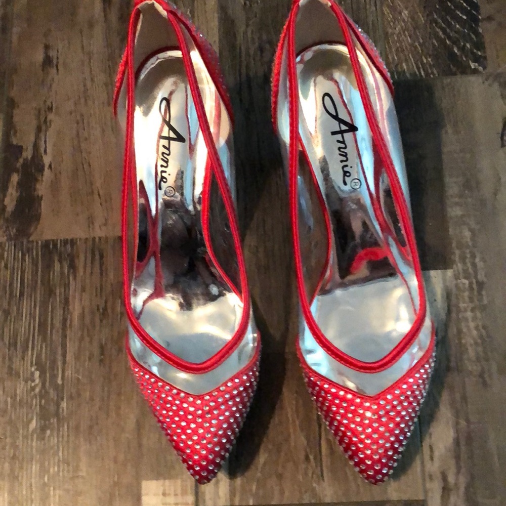 Like new. Worn only once Annie red satin with clear crystals, 2.5” heel